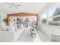 Inviting living area with ample natural light, comfortable seating, and a seamless flow to the modern kitchen at 3499 43Rd N St, St Petersburg, FL 33713