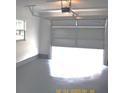 Clean and spacious garage with automatic opener at 4645 Commodore Ave, Spring Hill, FL 34606