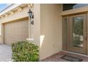 Front entry with decorative door and brick walkway at 207 Winding River Trl, Bradenton, FL 34212