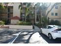 Exterior view of building with parking at 2400 Feather Sound Dr # 717, Clearwater, FL 33762
