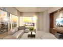 Spacious living room with water views and large TV at 411 E Shore Drive # 203, Clearwater Beach, FL 33767