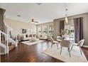 Open concept living and dining area with hardwood floors at 535 52Nd N Ave, St Petersburg, FL 33703