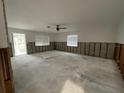 Large living area undergoing renovation with new flooring at 1798 Shore Acres Ne Blvd, St Petersburg, FL 33703