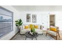 Light-filled living room with neutral tones and modern furniture at 6514 Mariner Blvd, Spring Hill, FL 34609