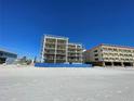 Beachfront property under construction, showcasing a modern building design at 14046 Gulf Blvd # 2, Madeira Beach, FL 33708