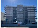 Multi-unit building under construction, featuring modern design and scaffolding at 14048 Gulf Blvd # 401, Madeira Beach, FL 33708