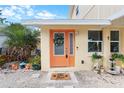 Inviting front door entrance with a welcoming doormat at 5507 Darlene St, Spring Hill, FL 34607