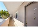 Building hallway with access to unit at 7540 Bay Island S Dr # 253, South Pasadena, FL 33707