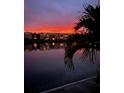 Stunning sunset over calm waters at 7540 Bay Island S Dr # 253, South Pasadena, FL 33707