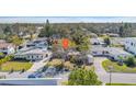 Aerial view of the home with a location marker, showcasing nearby amenities in a residential neighborhood at 90 Huron Ave, Tampa, FL 33606