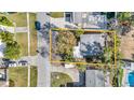 Aerial view of a single-story home highlighting its location, yard, and neighborhood at 90 Huron Ave, Tampa, FL 33606