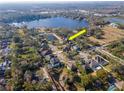 Aerial view showing home's location in a desirable neighborhood near a lake at 13904 Shadow Tree Ln, Tampa, FL 33618