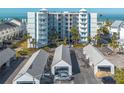 Aerial view of condo building and parking at 17980 Gulf Blvd # 403, Redington Shores, FL 33708