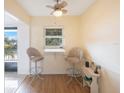 Small breakfast nook with two stools at 11485 Oakhurst Rd # A301, Largo, FL 33774