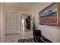 Bright hallway with tile flooring and built-in storage at 170 Eric Ct, Oldsmar, FL 34677