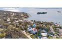 Aerial showing home's location on a canal, close to the bay at 1964 Cedar Dr, Dunedin, FL 34698