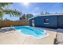 Inviting kidney-shaped pool in a backyard setting at 664 60Th S St, St Petersburg, FL 33707