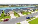 Community of homes with lakefront views and landscaping at 10023 Eventide Trl, Parrish, FL 34219