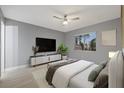 Spacious bedroom with large window and wood floors at 11162 Libby Rd, Spring Hill, FL 34609