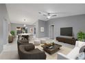 Bright living room with hardwood floors and modern furniture at 11162 Libby Rd, Spring Hill, FL 34609