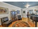 Bright living room with hardwood floors and piano at 314 33Rd Ne Ave, St Petersburg, FL 33704