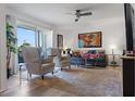 Living room with hardwood floors and access to balcony at 3824 37Th S St # 67, St Petersburg, FL 33711