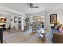 Bright living room with comfy seating and hardwood floors at 3824 37Th S St # 67, St Petersburg, FL 33711