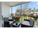 Relaxing screened porch with patio furniture at 3824 37Th S St # 67, St Petersburg, FL 33711