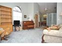 Bright and airy living room with ample natural light and a cozy atmosphere at 5565 Salem Square N Dr, Palm Harbor, FL 34685