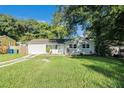 Newly renovated house with a large yard at 7202 N 21St St, Tampa, FL 33610