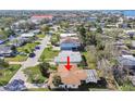 Take in this picturesque view of homes nestled in the heart of a tranquil neighborhood at 2480 Baywood E Dr, Dunedin, FL 34698
