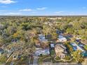 Aerial view showcasing the property's location in a residential neighborhood near the water at 345 Dr Ml King Jr N St, Safety Harbor, FL 34695