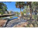 Private canal access with dock, ideal for kayaks or small boats at 6119 Beacon Point Dr, Weeki Wachee, FL 34607