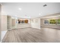 Spacious living room with neutral tones, recessed lighting, and an open floor plan at 651 Fort Duquesna Dr, Sun City Center, FL 33573