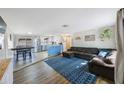 Open concept layout with a spacious living room and kitchen, perfect for entertaining at 10201 127Th Pl, Largo, FL 33773