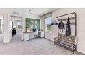 Bright home office features built-in desk and bench at 33166 Osprey Peak Way, San Antonio, FL 33576