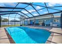 In ground pool with screened lanai and plenty of backyard space at 8421 Flagstone Dr, Tampa, FL 33615