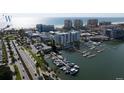 Aerial view showcasing the waterfront condos location with boat docks and easy access to the city at 411 E Shore Dr # Ph1, Clearwater Beach, FL 33767