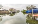 Scenic view of a peaceful canal with boats and waterfront homes at 4643 Bay Crest Dr, Tampa, FL 33615