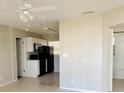 Bright kitchen featuring white cabinets and black appliances at 6601 65Th N Way, Pinellas Park, FL 33781