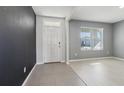 Bright foyer with tile flooring, modern paint, and ample natural light at 2604 Knight Island Dr, Brandon, FL 33511