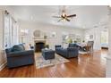 Spacious living room with hardwood floors, fireplace, and open dining area at 468 11Th N Ave, St Petersburg, FL 33701