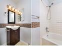 Bathroom with a vanity sink and a shower and bathtub combination at 1337 Coolmont Dr, Brandon, FL 33511