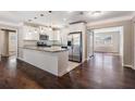 Modern kitchen featuring stainless steel appliances, granite countertops, and white cabinets at 5020 16Th N Ave, St Petersburg, FL 33710