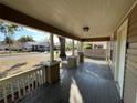 Spacious covered porch, ideal for relaxing and enjoying neighborhood views at 101 W Fern St, Tampa, FL 33604