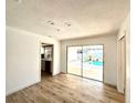 Bright dining area with sliding glass doors that lead to the pool area at 13290 75Th Ave, Seminole, FL 33776