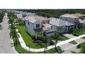 An aerial view of a home with mature landscaping in a desirable neighborhood at 923 Seagrape Dr, Ruskin, FL 33570