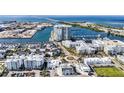 Aerial view of waterfront community with shops and residential buildings at 5120 Marina Way # 14002, Tampa, FL 33611