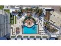 Top-down view of a resort-style pool and spacious deck area at 5120 Marina Way # 14002, Tampa, FL 33611