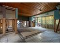 Under construction interior, showing exposed framing and flooring at 9810 Parsons St, Tampa, FL 33615